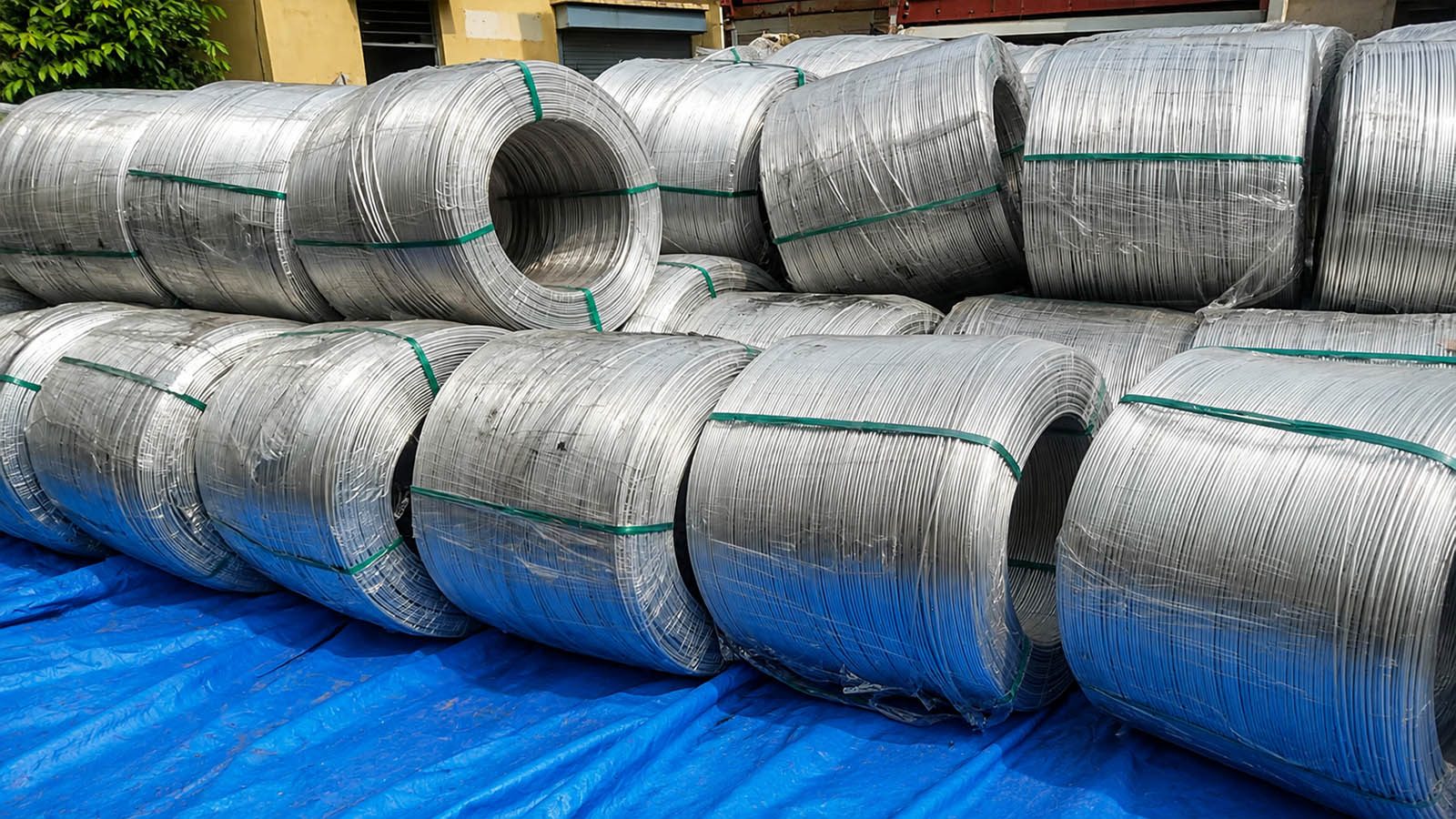 Coils of wire rod wrapped and stacked ready for handling
