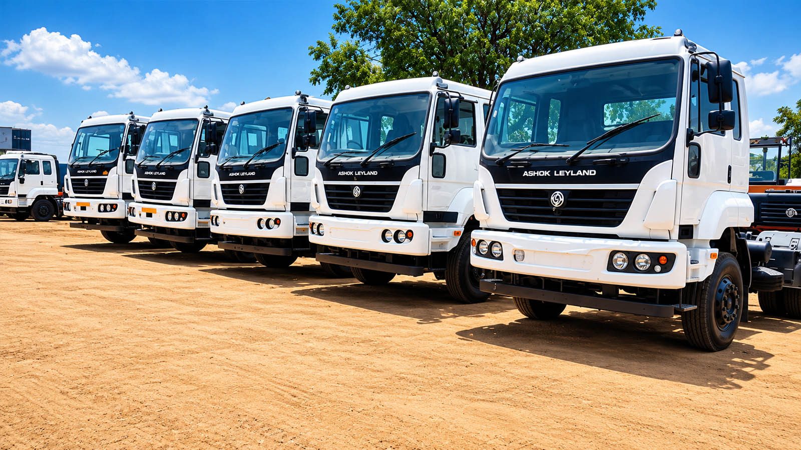 Commercial trucks parked in a vehicle yard
